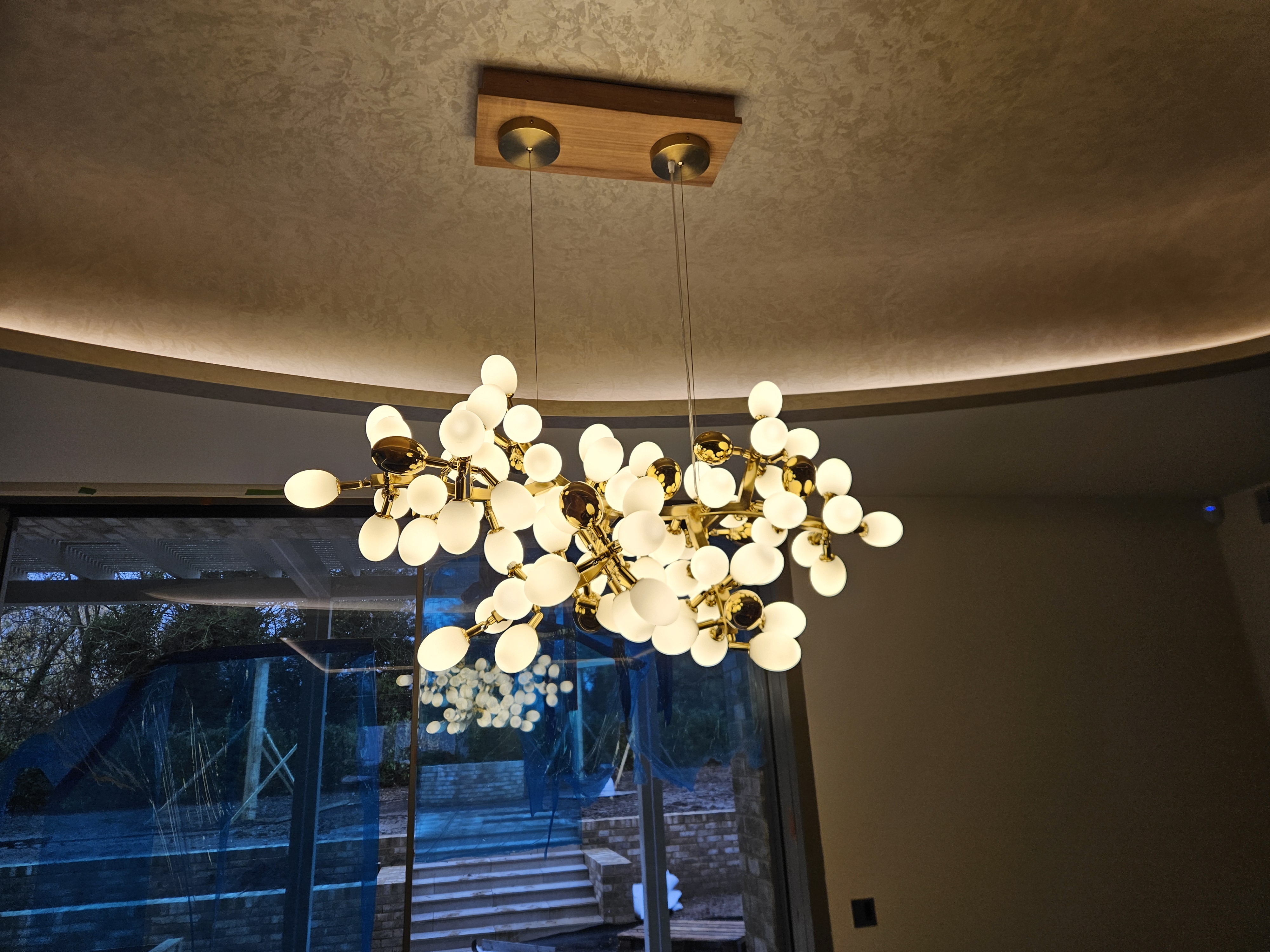 Statement chandelier and ceiling lighting installation